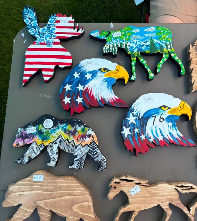 Hand-painted wooden moose, bear and eagle cutouts